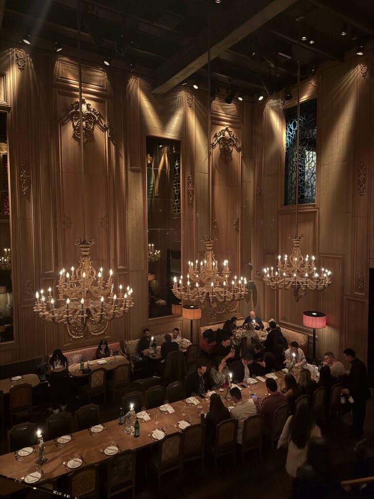 Interior of Buddakan restaurant in New York City with dramatic chandeliers and dining space