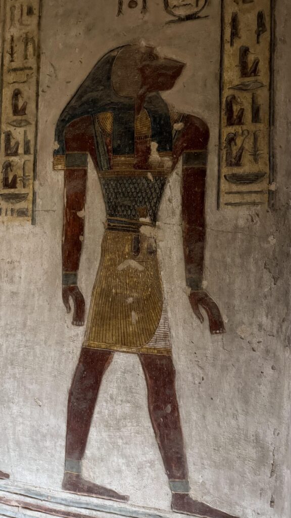 Ancient painting of Anubis, the jackal-headed god, on tomb wall in Valley of the Kings, Luxor