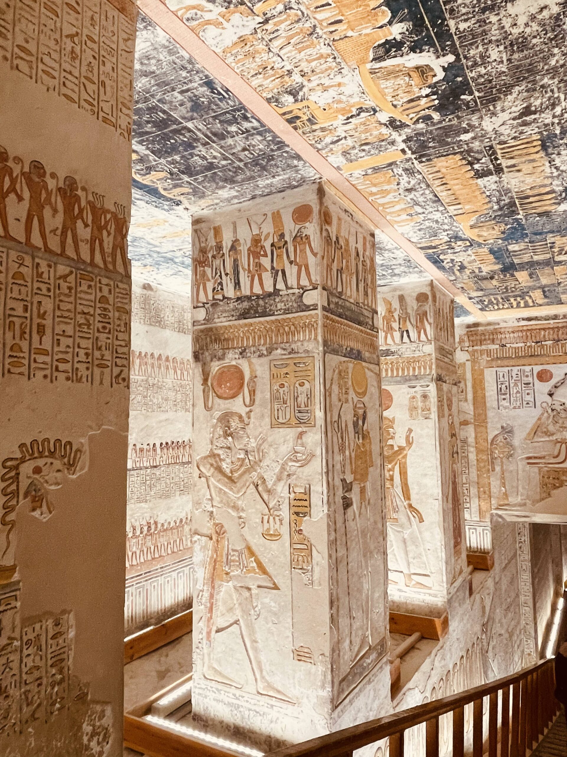 Decorated stone pillars with pharaonic artwork inside Valley of the Kings tomb, Luxor